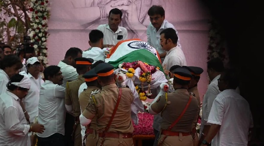 Asha Bhosle merges five elements son Anand lights funeral pyre final rites performed state honors.